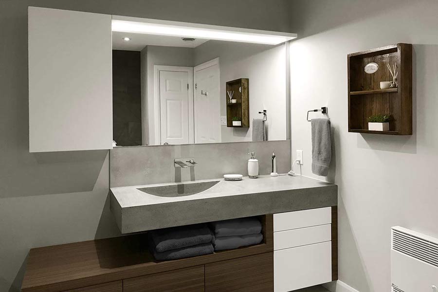 Vanité avec comptoir-lavabo en béton
